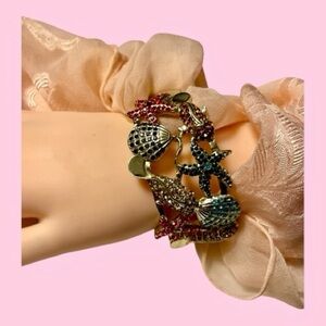 Under-the-Sea Rhinestone Cuff Bracelet, Gold-Tone, Featuring Starfish & Shells.